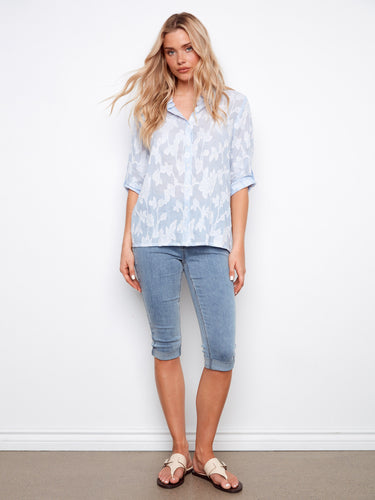 The roll-up 3/4 sleeves add versatility to this all-over embroidered shirt, perfect for any occasion by Charlie B.