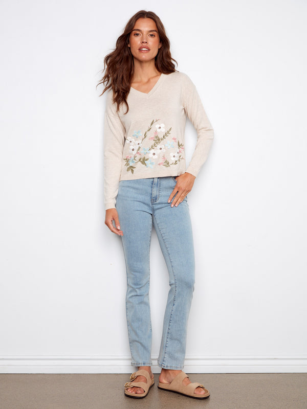 Floral embroidered sweater in beige with a soft V-neckline, made from pure cotton for a cozy feel by Charlie B.
