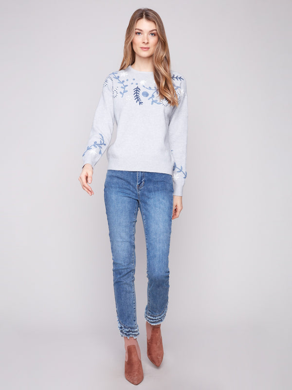 Heather grey crew neck sweater beautifully adorned with floral embroidery for a classic touch by Charlie B.