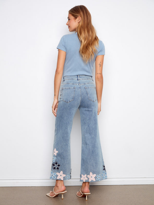 Featuring floral embroidery, these jeans bring a playful and feminine touch to any ensemble. Stand out with this unique design by Charlie B.