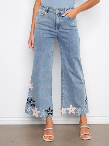 With raw hem detail, these jeans add an edgy twist to traditional denim styles, making them perfect for trendsetters by Charlie B.