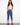 Medium blue jeans with a straight leg and five-pocket design, featuring embroidered cuffs by Charlie B.