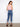 Stretch denim cropped jeans in medium blue, showcasing beautiful embroidery on the cuffs by Charlie B.
