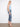 Five-pocket design medium blue jeans with intricate embroidery on the cuffs, offering a chic look by Charlie B.