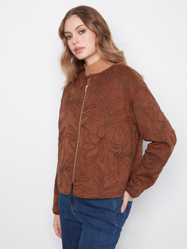Stylish brown bomber jacket in faux suede with eye-catching floral embroidery and front zipper closure by Charlie B.