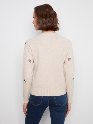 A beautiful blend of style and comfort with its crew neck and floral embroidery details. By Charlie B.