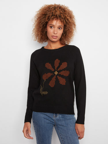 Black sweater with crew neck and distinct floral embroidery, perfect for any season by Charlie B.