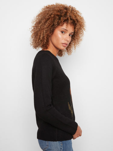 Versatile black raglan sleeve sweater with detailed floral design, a wardrobe staple by Charlie B.