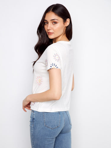 Crafted from 100% cotton, this tee offers comfort and style by Charlie B.