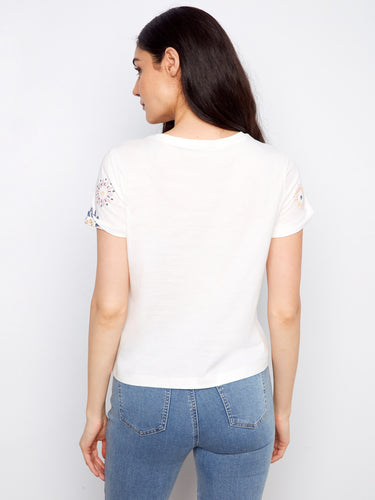 Featuring a classic crew neckline, this top is perfect for any occasion by Charlie B.
