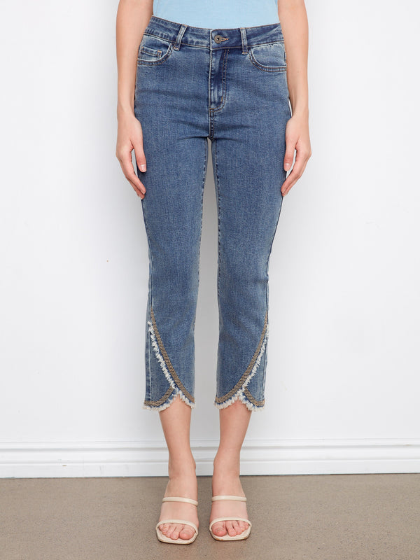 These jeans showcase a frayed embroidered tulip hem, adding unique detail to your wardrobe essentials by Charlie B.