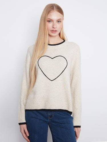 Sweater featuring a cozy crew neckline with ribbed detailing for added comfort and style. Perfect for any casual outing. By Charlie B.