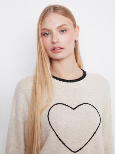 Designed with drop shoulders, this sweater offers a relaxed fit that pairs effortlessly with jeans or skirts. By Charlie B.
