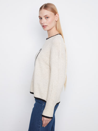 Ribbed cuffs and hem enhance the fit and structure of this stylish sweater, ensuring it stays in place all day long. By Charlie B.