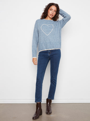 Blue sweater with cozy long sleeves and intricate heart embroidery, perfect for a relaxed look by Charlie B.