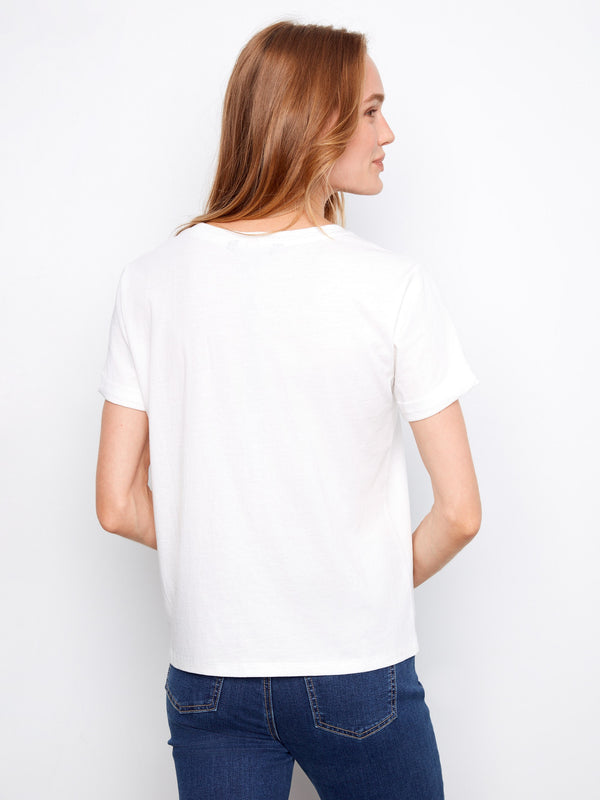 Stylish white T-shirt showcasing a comfortable fit with its soft 100% cotton fabric by Charlie B.