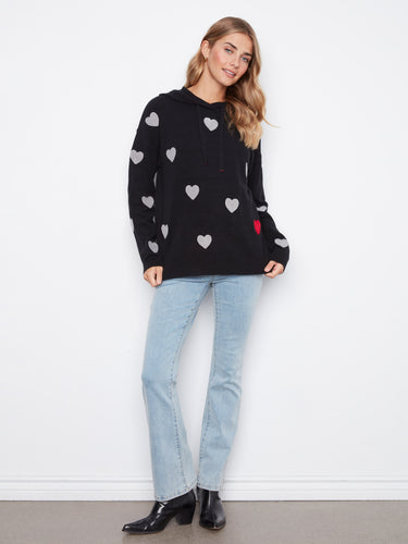 Charming heart-patterned hoodie with long sleeves, perfect for a casual day out. Crafted from soft knit fabric. By Charlie B.