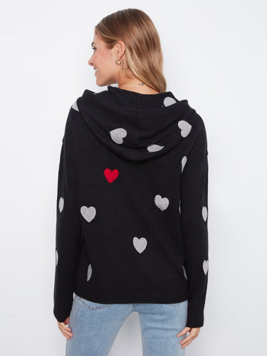 Cozy knit hoodie embellished with playful hearts, offering comfort and style in every wear. By Charlie B.