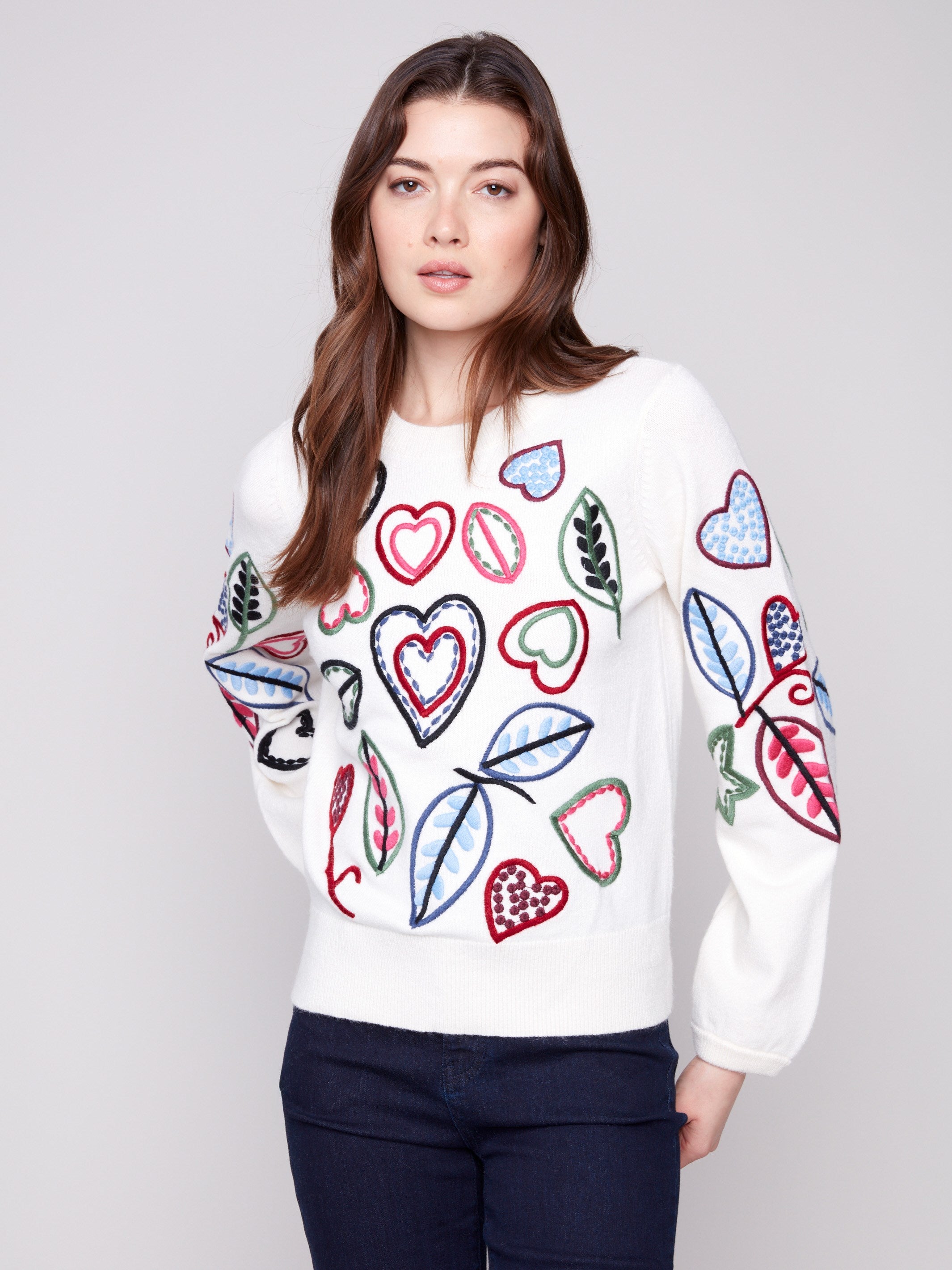 Ecru sweater adorned with hearts and leaves embroidery, showcasing a relaxed fit for ultimate comfort by Charlie B.