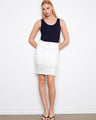 This skirt features a slim fit design with built-in shorts, offering comfort and style for any occasion by Charlie B.