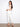 White cropped jeans featuring a stylish slim fit and stretch denim by Charlie B.