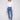 Medium blue jeans with a slim leg fit, featuring ankle-length cut and stylish embroidered hem by Charlie B.