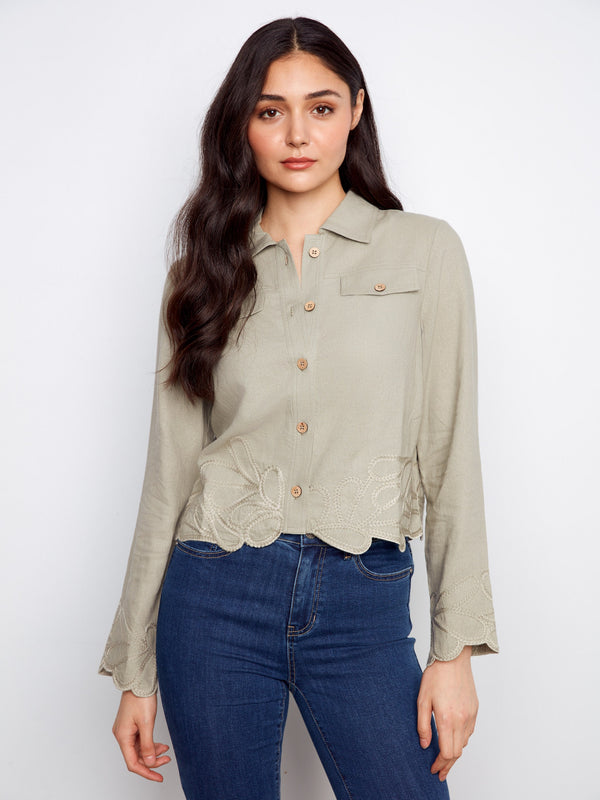 This jacket features a short length design, perfect for layering with your favorite outfits. The delicate details enhance its elegance by Charlie B.