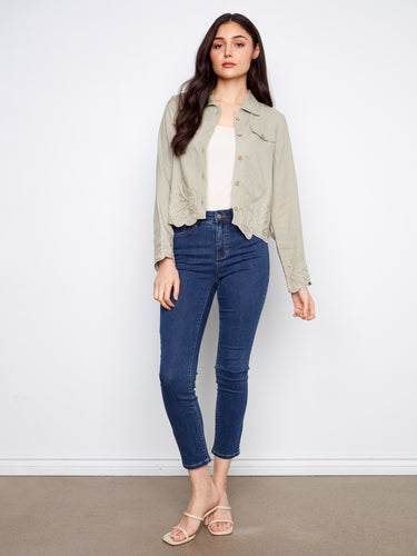Adorned with an embroidered hem and cuffs, this jacket adds a touch of sophistication to any ensemble. A versatile piece by Charlie B.