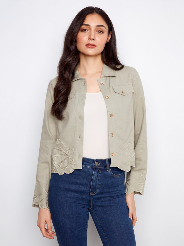 With its unique embroidered details and functional button closure, this jacket is the epitome of casual elegance by Charlie B.