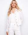 White linen jacket with a short length and stylish button closure, featuring intricate embroidery by Charlie B.