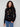Elegant black sweater with intricate embroidered floral details, perfect for a chic look by Charlie B.