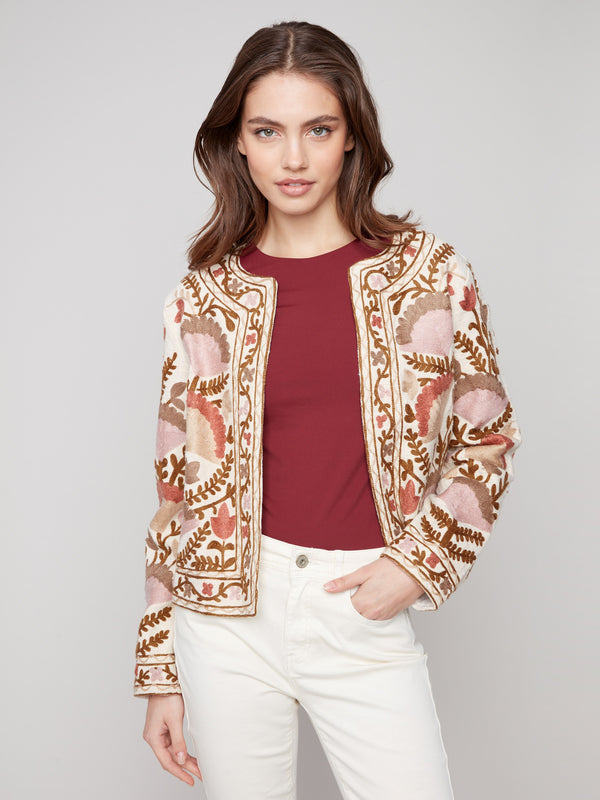 Embrace the charm of this short length jacket, featuring intricate embroidery and a chic open front by Charlie B.