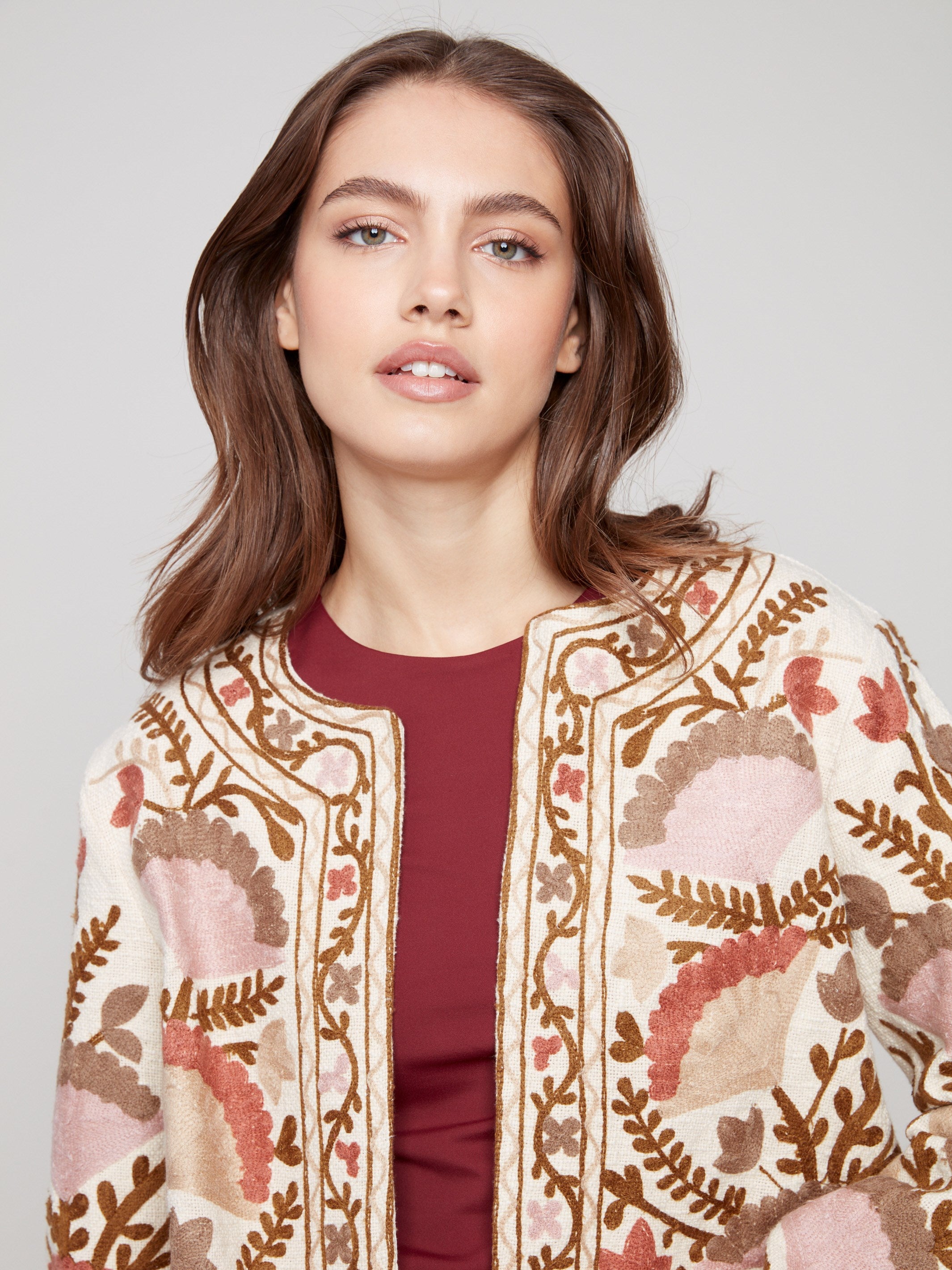 Discover sophistication with set-in long sleeves on this beautifully embroidered jacket, perfect for any occasion by Charlie B.