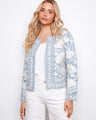 Light blue embroidered jacket in 100% cotton, featuring a floral design with set-in long sleeves by Charlie B.
