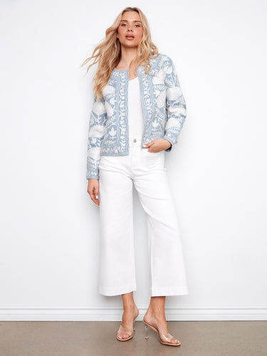 This short-length jacket showcases intricate embroidery and an open front, crafted from pure cotton by Charlie B.