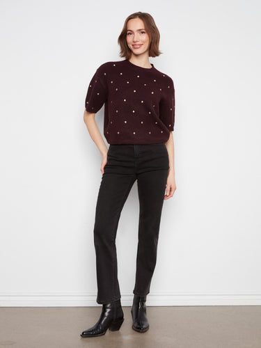Stylish relaxed fit in a heather-wine knit, complete with mock neck and playful polka dots by Charlie B.