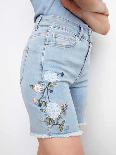 These light blue shorts showcase beautiful side embroidery on stretch denim fabric for flexible wear by Charlie B.