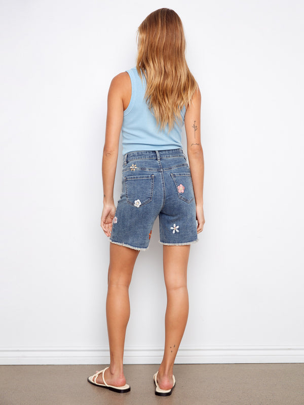 Crafted from stretch denim fabric, these shorts offer comfort and flexibility by Charlie B.