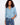 Blue blouse with floral embroidery and a collared V-neckline, highlighted by a chest pocket for added style by Charlie B.