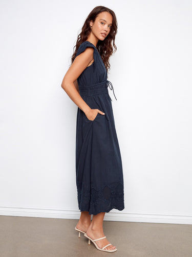 Styled with ruffle cap sleeves, this dress offers a touch of elegance and femininity. By Charlie B.