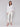Elegant white blouse featuring eyelet embroidery details by Charlie B.