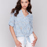 Blue cotton blouse with V-neck and front tie, perfect for casual wear by Charlie B.