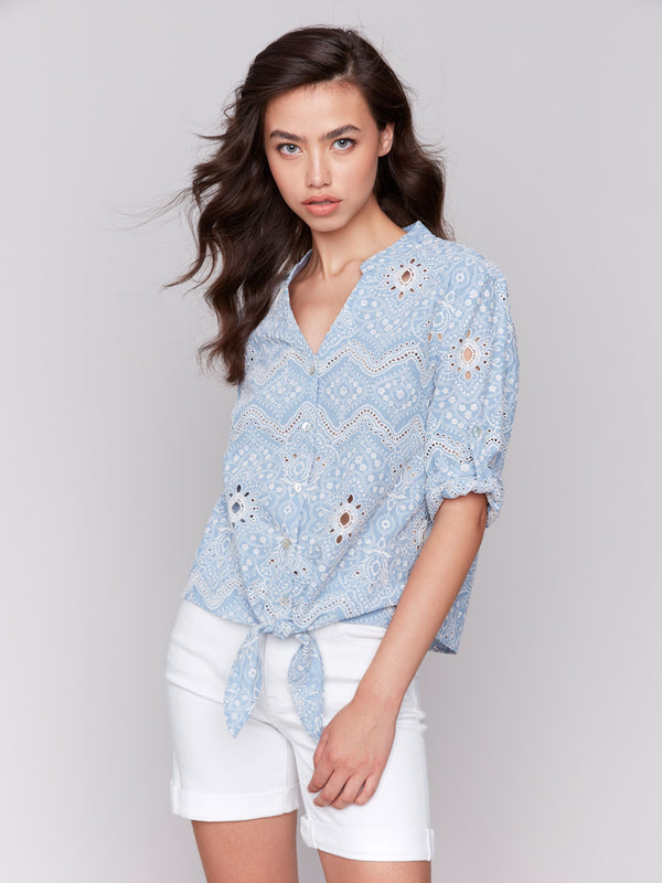 Elegant blue blouse with a front tie knot at the hem, crafted from cotton by Charlie B.