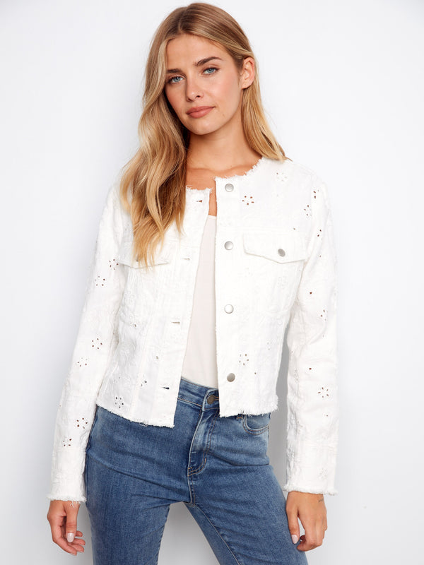 White eyelet denim jacket with frayed hem and button front, showcasing stylish flap pockets by Charlie B.