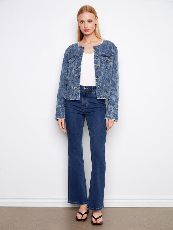 Stylish denim jacket with button front closure adds a classic touch to any outfit by Charlie B.