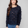 Navy blue chiffon blouse featuring a boat neck and elegant long sleeves, showcasing intricate details by Charlie B.