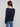 Sophisticated navy blue blouse with button cuffs and a delicate button closure at the back, crafted by Charlie B.