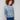Blue denim sweater featuring drop shoulders and a ribbed hem, perfect for a casual look by Charlie B.