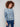 Blue denim sweater featuring drop shoulders and a ribbed hem, perfect for a casual look by Charlie B.