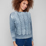 Blue denim sweater featuring drop shoulders and a ribbed hem, perfect for a casual look by Charlie B.